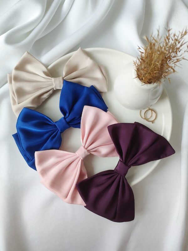 Mała kokarda do włosów handmade – Zszywka